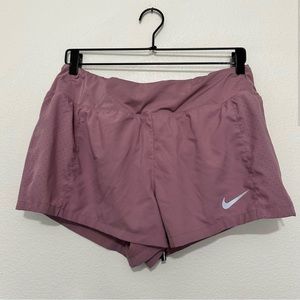 nike running shorts in mauve
